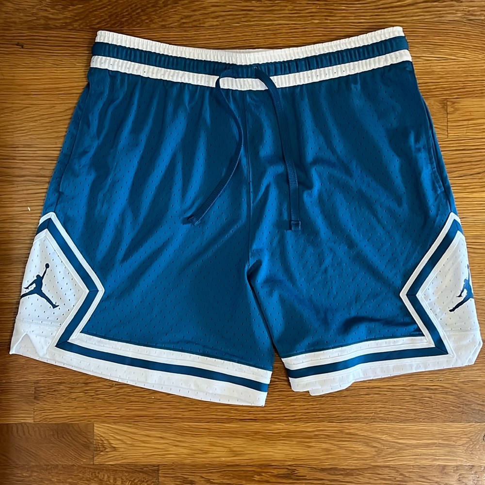 Air Jordan blue and white basketball shorts brand new with tags.